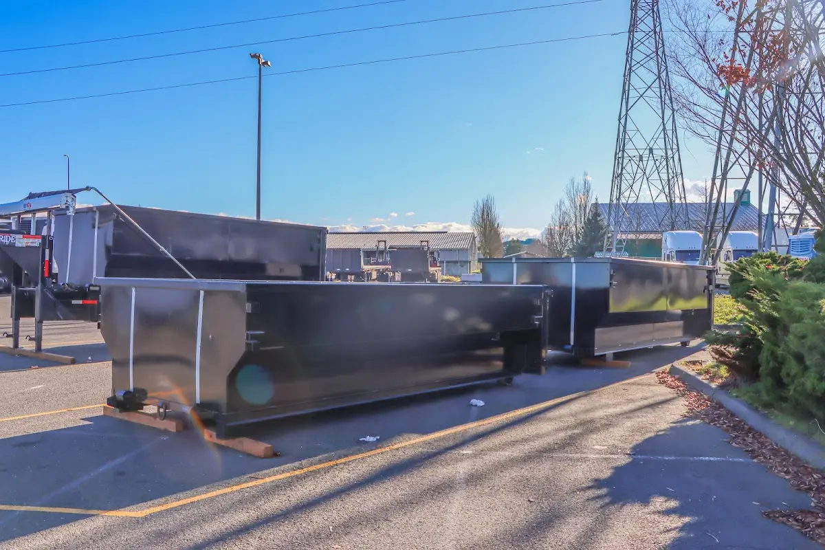 Roll-off dumpster ready for waste disposal at job site for Construction Dumpster Rental in North Bend